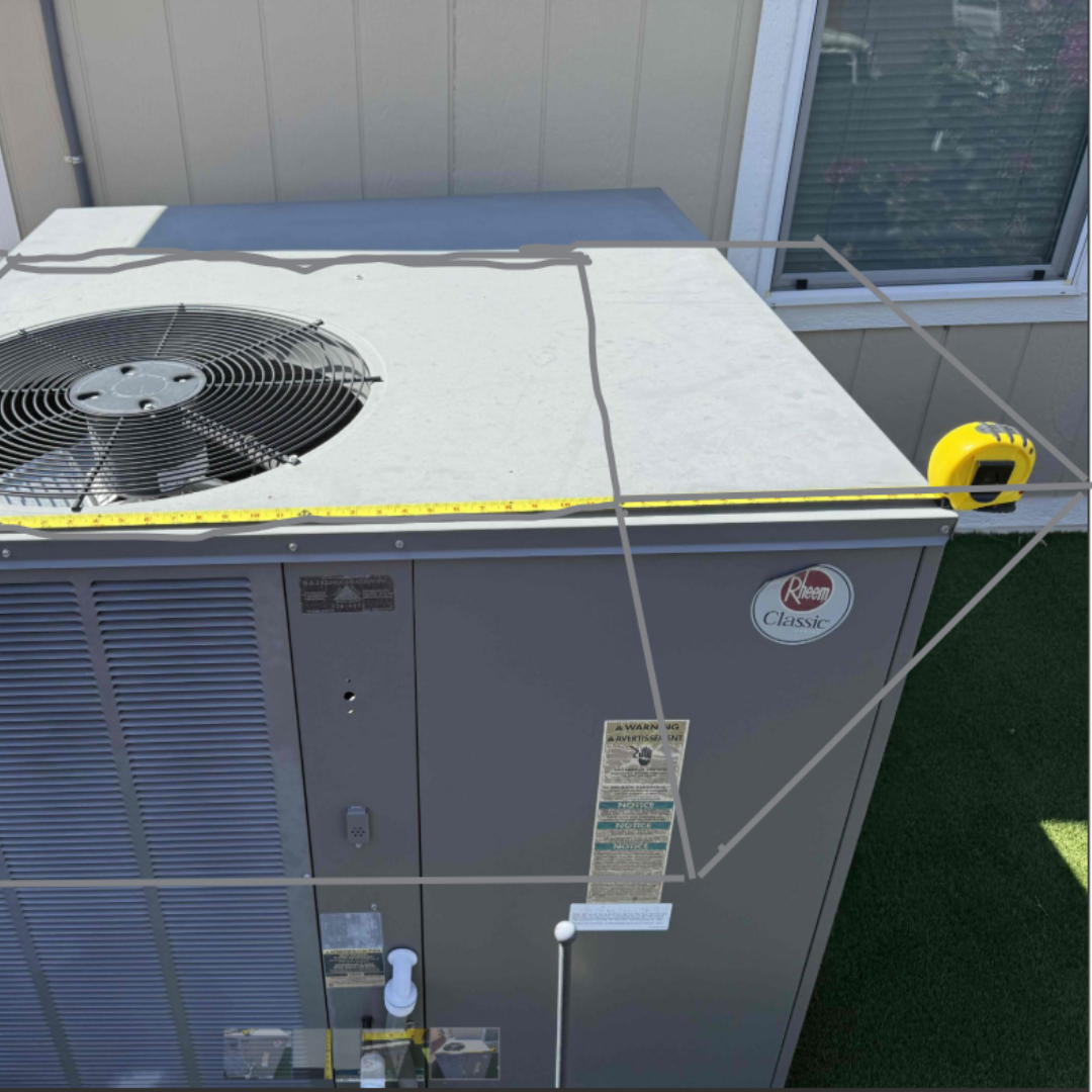 Measuring an AC unit with a tape measure